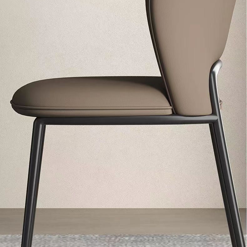 Silla de comedor escandinava contemporánea de cuero de microfibra cuadrada con respaldo de ala de acero al carbono para comedor 
