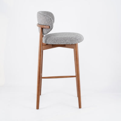 Tabouret de bar contemporain nordique rond en tissu avec cadre en bois massif, dossier bas et repose-pieds pour salle à manger 