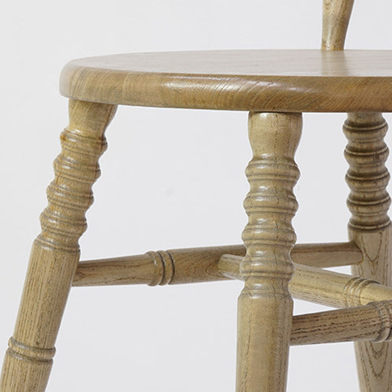 Chaise de salle à manger moderne du milieu du siècle en bois massif rond avec dossier à broches et repose-pieds 