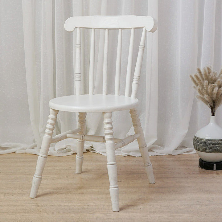 Chaise de salle à manger moderne du milieu du siècle en bois massif rond avec dossier à broches et repose-pieds 