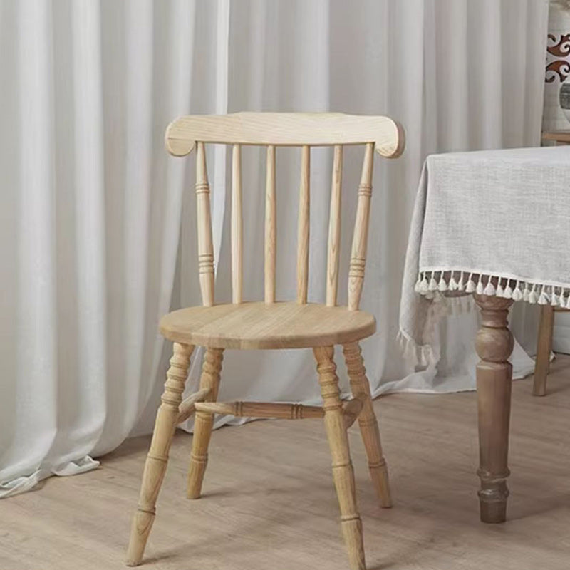 Chaise de salle à manger moderne du milieu du siècle en bois massif rond avec dossier à broches et repose-pieds 