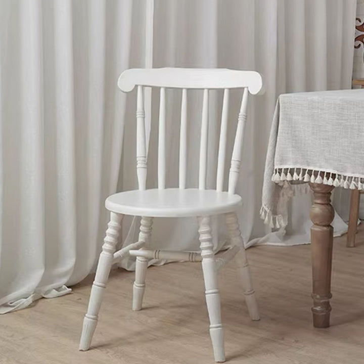 Chaise de salle à manger moderne du milieu du siècle en bois massif rond avec dossier à broches et repose-pieds 