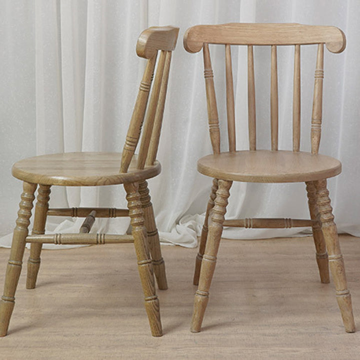 Chaise de salle à manger moderne du milieu du siècle en bois massif rond avec dossier à broches et repose-pieds 
