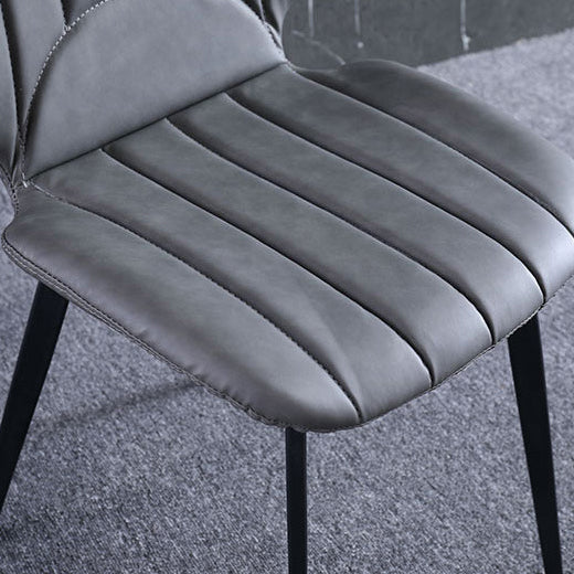Contemporary Luxury Faux Leather Upholstered Carbon Steel Dining Chair Ribbed Backrest For Living Room