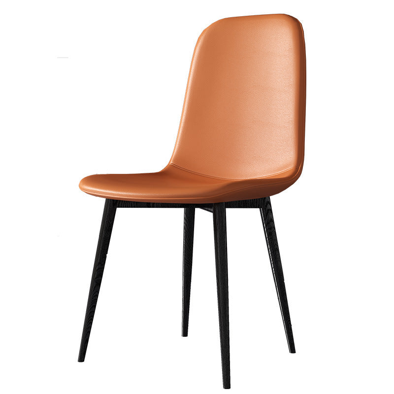 Chaise de salle à manger contemporaine en acier au carbone avec revêtement en similicuir incurvé pour salon 