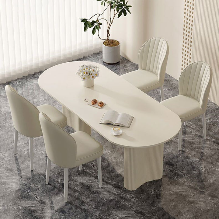 Chaise de salle à manger contemporaine nordique en acier au carbone ovale carrée avec dossier en similicuir 