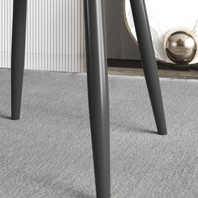 Chaise de salle à manger en cuir à dossier trapézoïdal moderne de luxe en acier au carbone pour salle à manger 