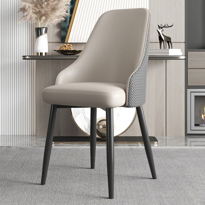 Chaise de salle à manger en cuir à dossier trapézoïdal moderne de luxe en acier au carbone pour salle à manger 