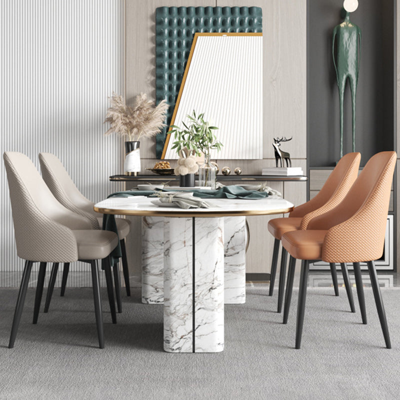 Chaise de salle à manger en cuir à dossier trapézoïdal moderne de luxe en acier au carbone pour salle à manger 
