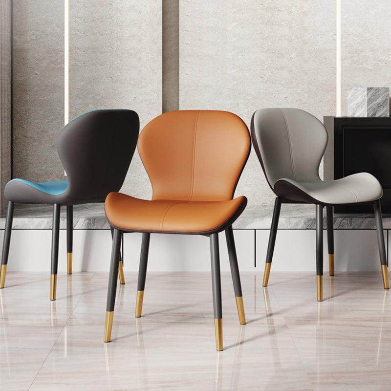 Respaldo de silla de comedor de acero al carbono de cuero con cojín trapezoidal de simplicidad moderna para comedor 