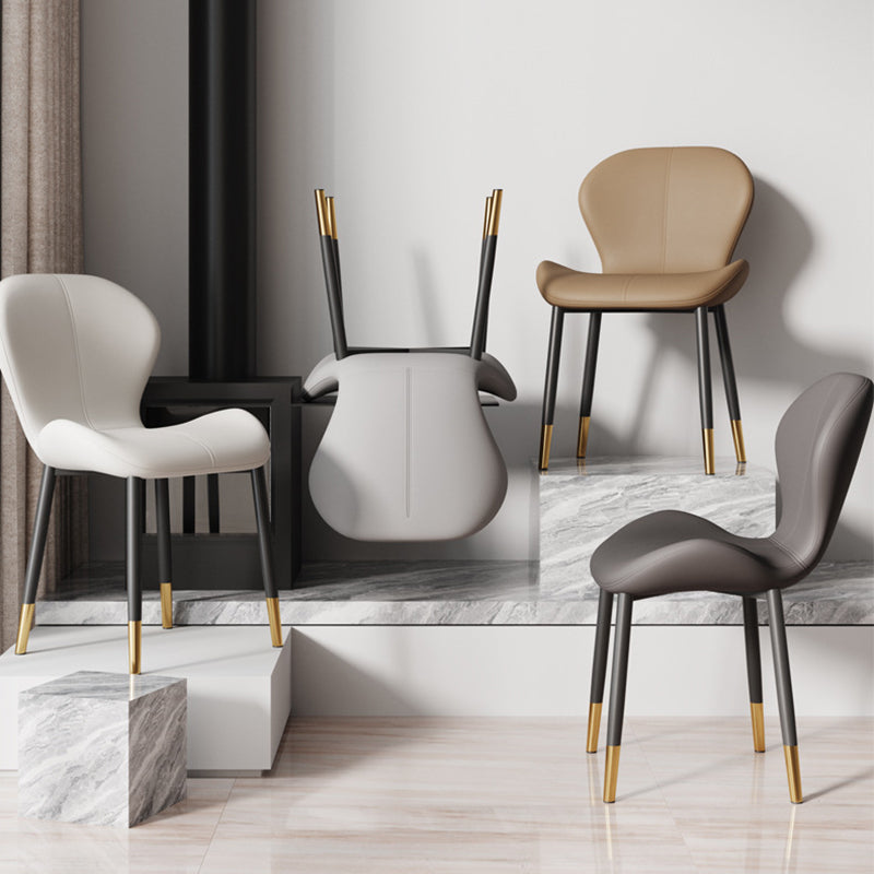Respaldo de silla de comedor de acero al carbono de cuero con cojín trapezoidal de simplicidad moderna para comedor 