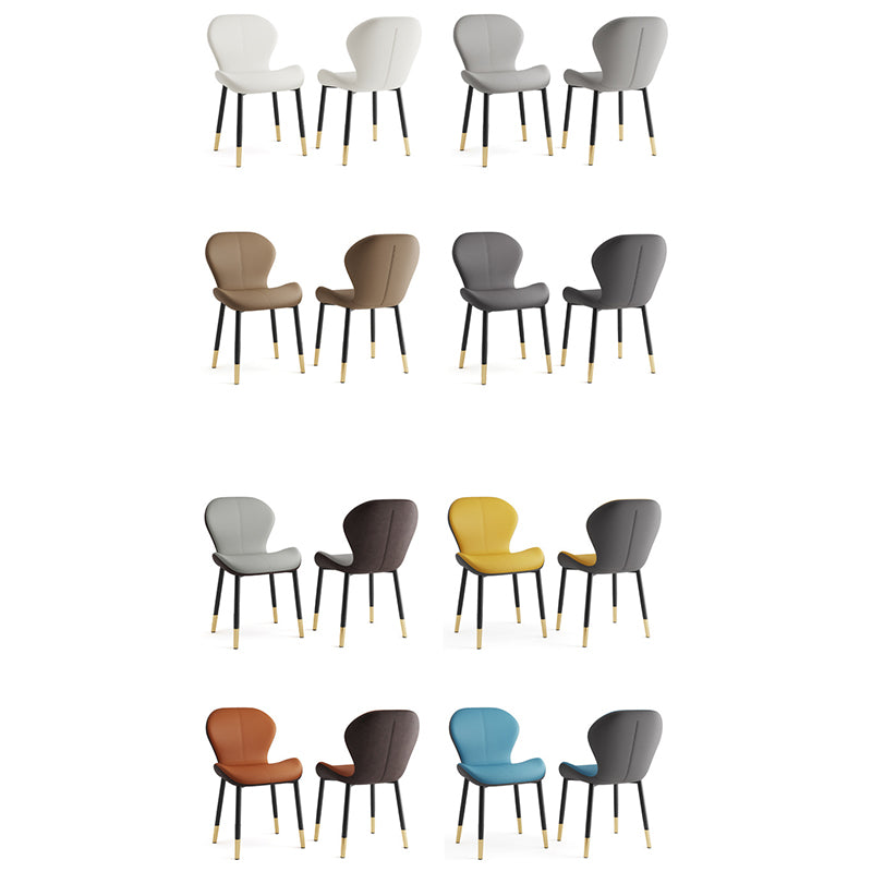 Respaldo de silla de comedor de acero al carbono de cuero con cojín trapezoidal de simplicidad moderna para comedor 