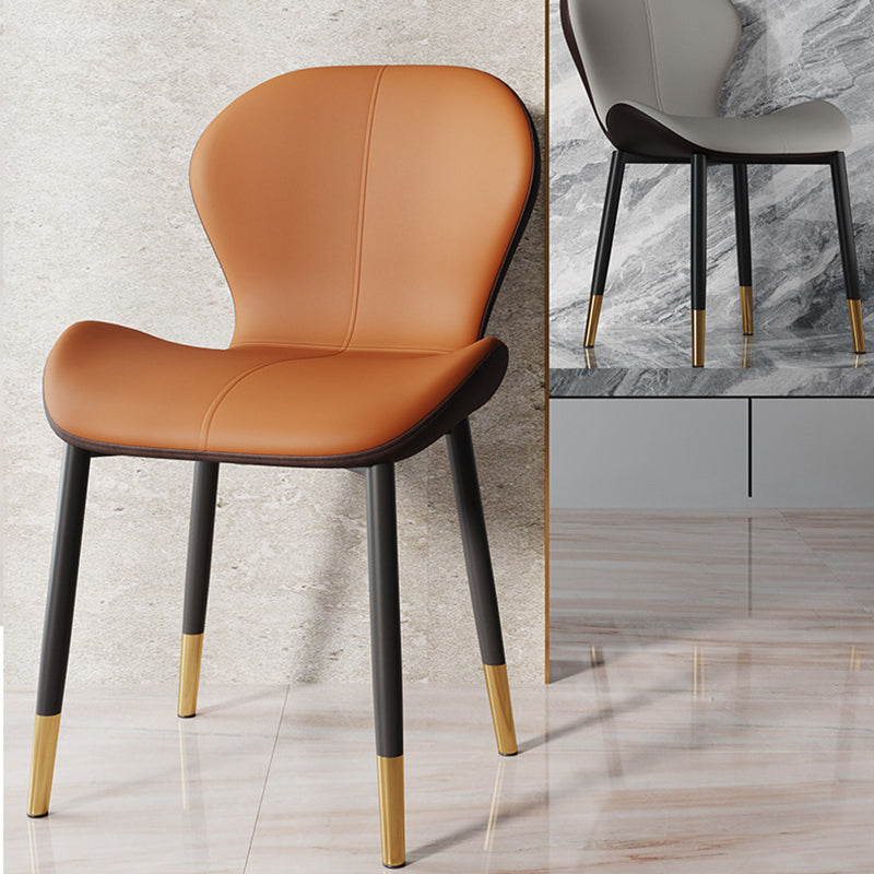 Respaldo de silla de comedor de acero al carbono de cuero con cojín trapezoidal de simplicidad moderna para comedor 