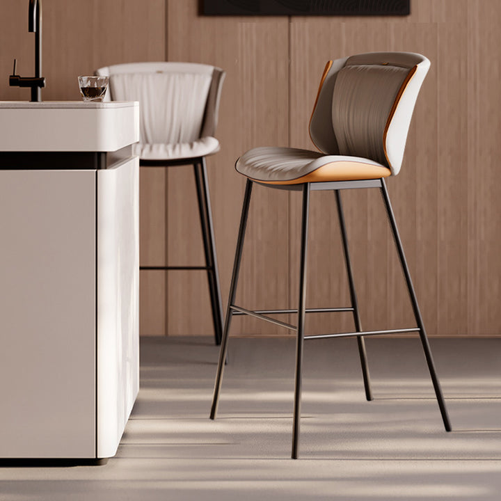 Taburete de bar moderno de lujo con cojín trapezoidal, cuero sintético, acero al carbono y respaldo para comedor 