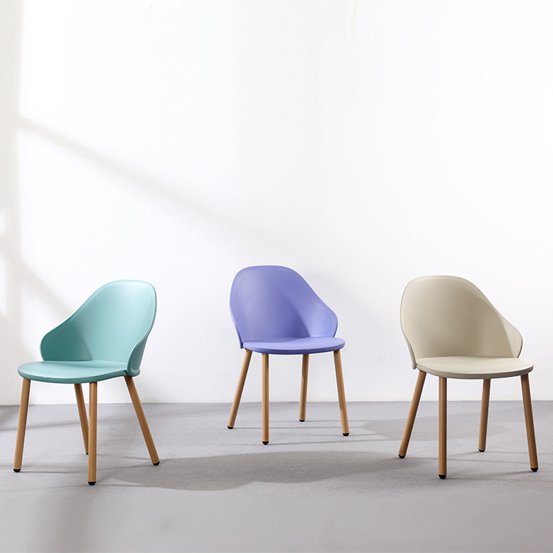 Contemporary Scandinavian Sleek Backrest Plastic Dining Chair With Solid Wood Legs For Dining Room