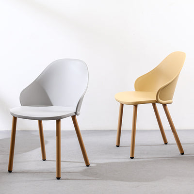 Contemporary Scandinavian Sleek Backrest Plastic Dining Chair With Solid Wood Legs For Dining Room