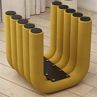 Zeitgenössischer kreativer Bogen Kohlenstoffstahl Samtschwamm niedriger Hocker ohne Rückenlehne und Armlehnen für das Wohnzimmer 