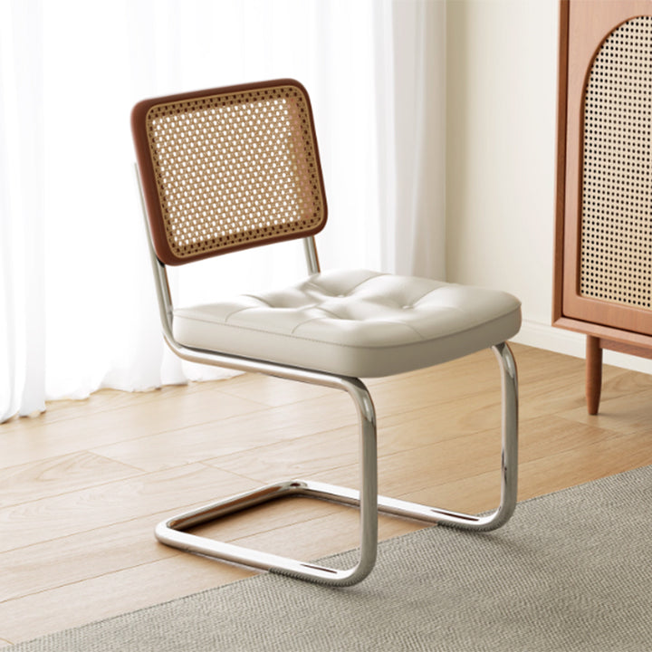 Chaise de salle à manger traditionnelle vintage en arc en acier inoxydable avec dosseret en cuir, éponge, plastique et rotin tissé sans accoudoirs 