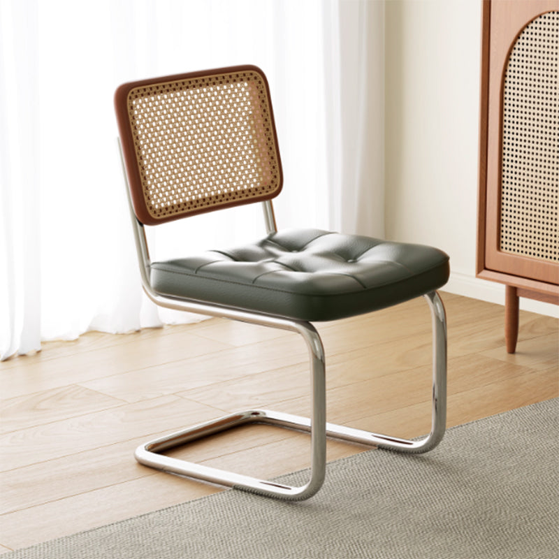 Chaise de salle à manger traditionnelle vintage en arc en acier inoxydable avec dosseret en cuir, éponge, plastique et rotin tissé sans accoudoirs 