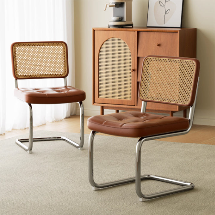 Chaise de salle à manger traditionnelle vintage en arc en acier inoxydable avec dosseret en cuir, éponge, plastique et rotin tissé sans accoudoirs 