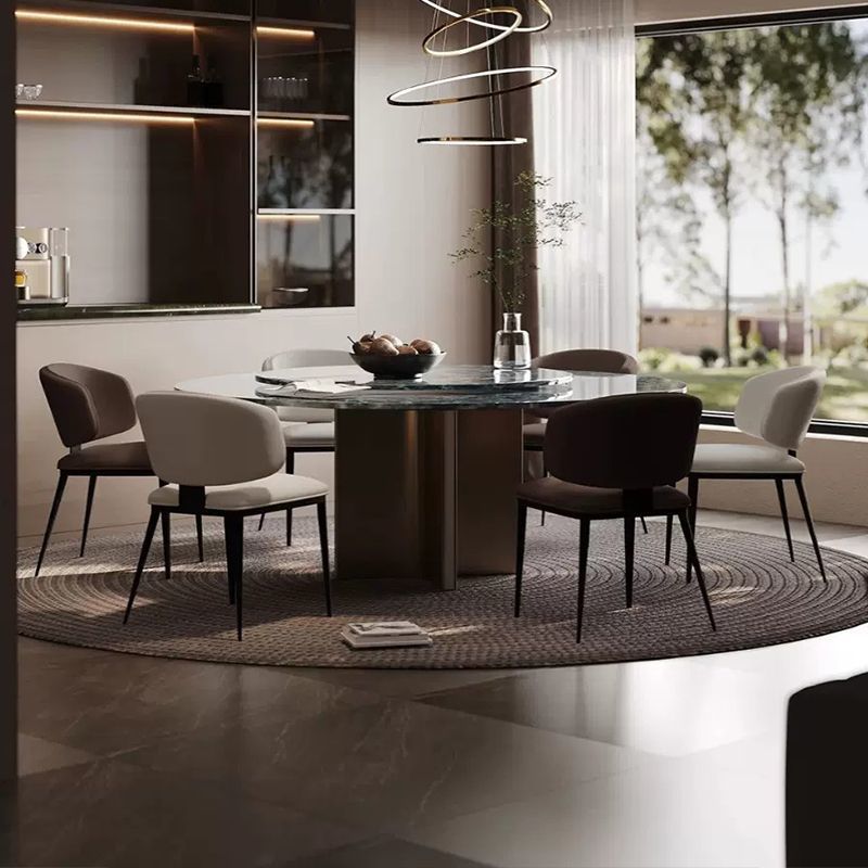 Chaise de salle à manger contemporaine en acier au carbone de luxe avec dossier sans accoudoirs en similicuir et éponge 