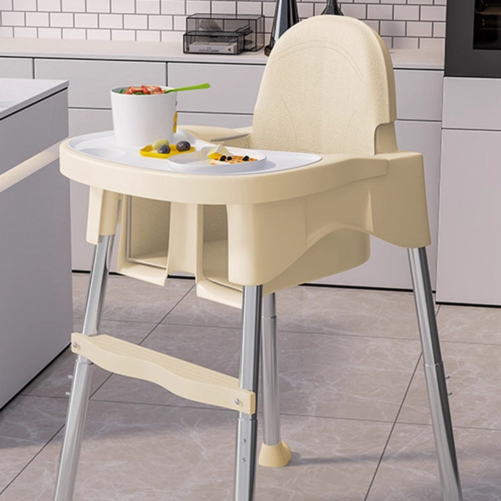 Chaise de salle à manger pour enfants en PP, cuir PU et acier inoxydable, au design moderne minimaliste, trapézoïdal arqué et relevable, avec dossier et accoudoirs 