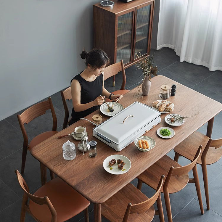 Moderner minimalistischer quadratischer gebogener gepolsterter Kissen-Walnuss-Holz-Esszimmerstuhl Rückenlehne ohne Armlehnen für Esszimmer 