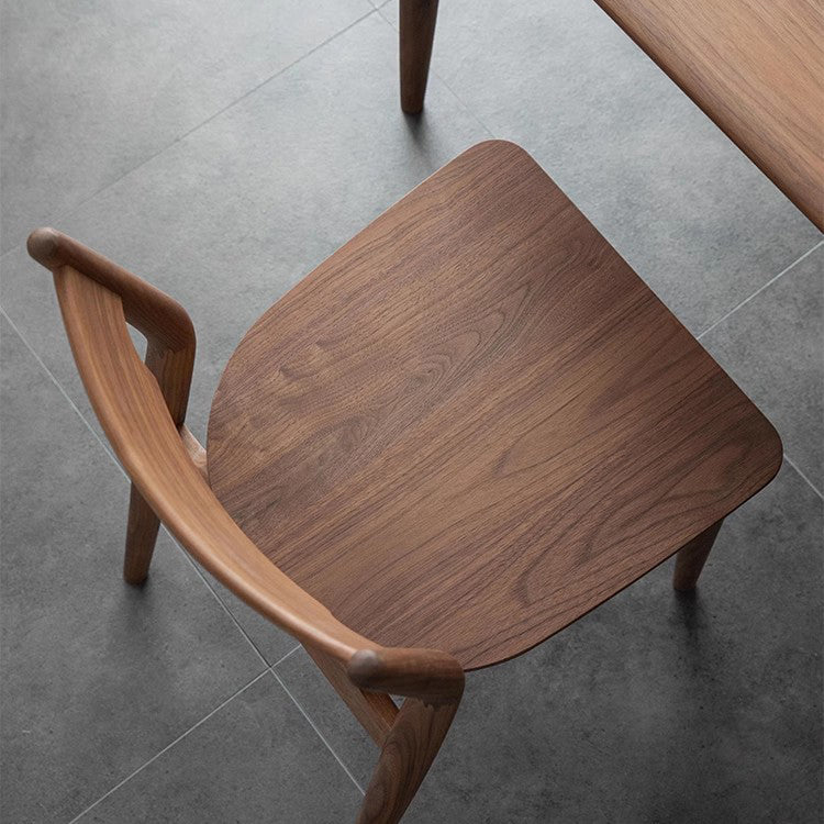 Moderner minimalistischer quadratischer gebogener gepolsterter Kissen-Walnuss-Holz-Esszimmerstuhl Rückenlehne ohne Armlehnen für Esszimmer 