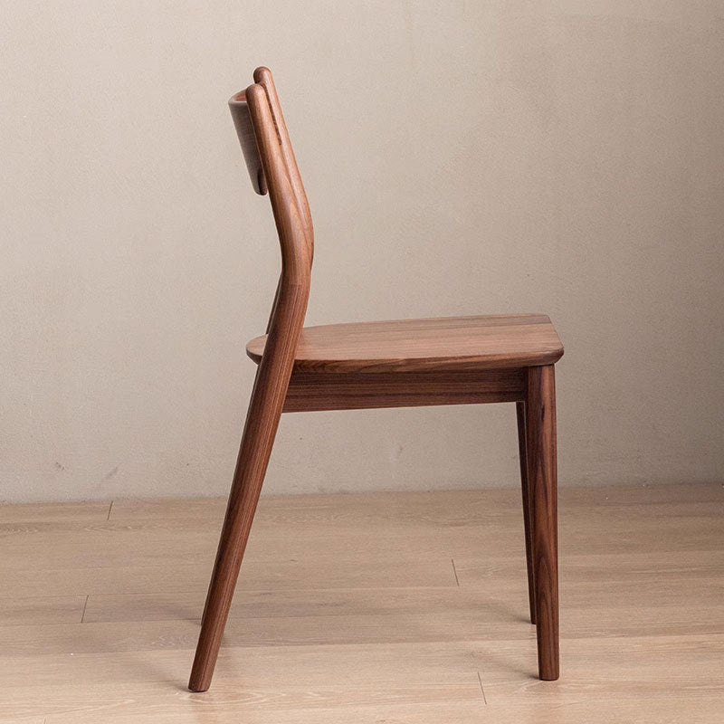 Moderner minimalistischer quadratischer gebogener gepolsterter Kissen-Walnuss-Holz-Esszimmerstuhl Rückenlehne ohne Armlehnen für Esszimmer 
