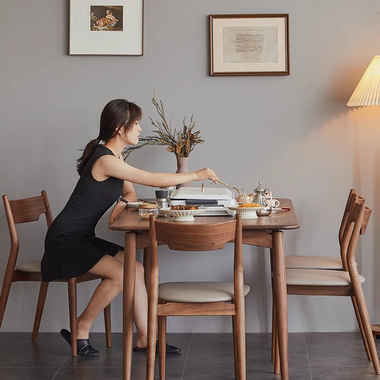 Moderner minimalistischer quadratischer gebogener gepolsterter Kissen-Walnuss-Holz-Esszimmerstuhl Rückenlehne ohne Armlehnen für Esszimmer 