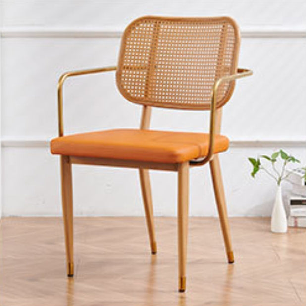 Chaise de salle à manger en cuir PU découpé moderne de luxe avec dossier en métal et rotin en bambou 