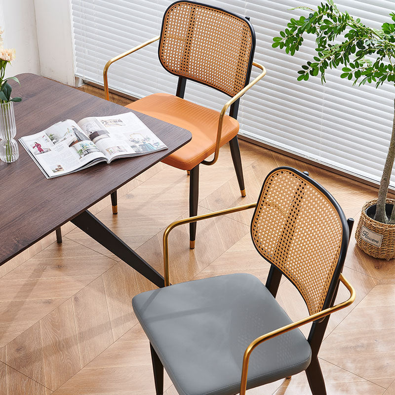 Chaise de salle à manger en cuir PU découpé moderne de luxe avec dossier en métal et rotin en bambou 