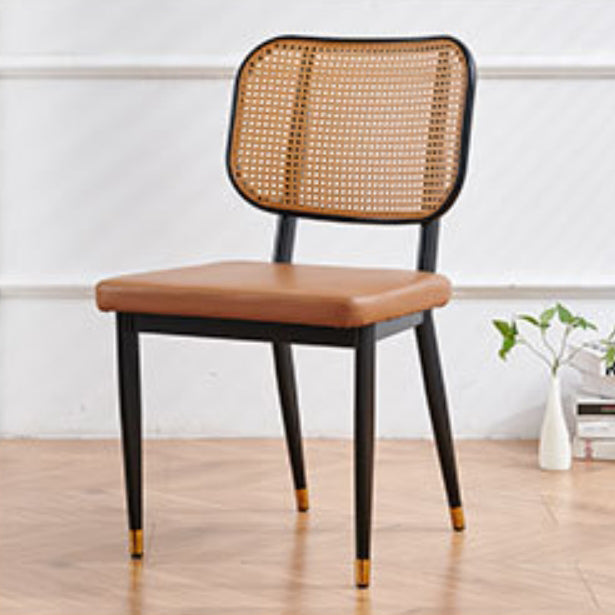 Chaise de salle à manger en cuir PU découpé moderne de luxe avec dossier en métal et rotin en bambou 