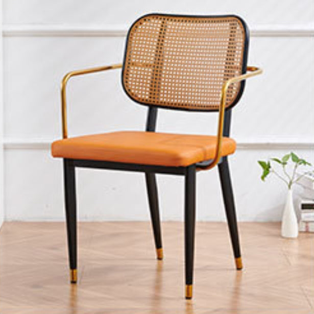 Chaise de salle à manger en cuir PU découpé moderne de luxe avec dossier en métal et rotin en bambou 