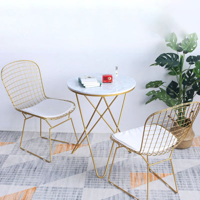 Respaldo de silla de comedor de metal de cuero curvado cuadrado calado escandinavo contemporáneo con brazo para comedor 