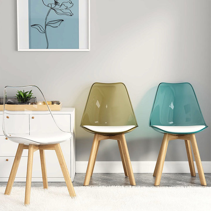 Zeitgenössischer nordischer transparenter PU-Leder-PC-gepolsterter Hochlehner-Esszimmerstuhl ohne Armlehnen für das Esszimmer 