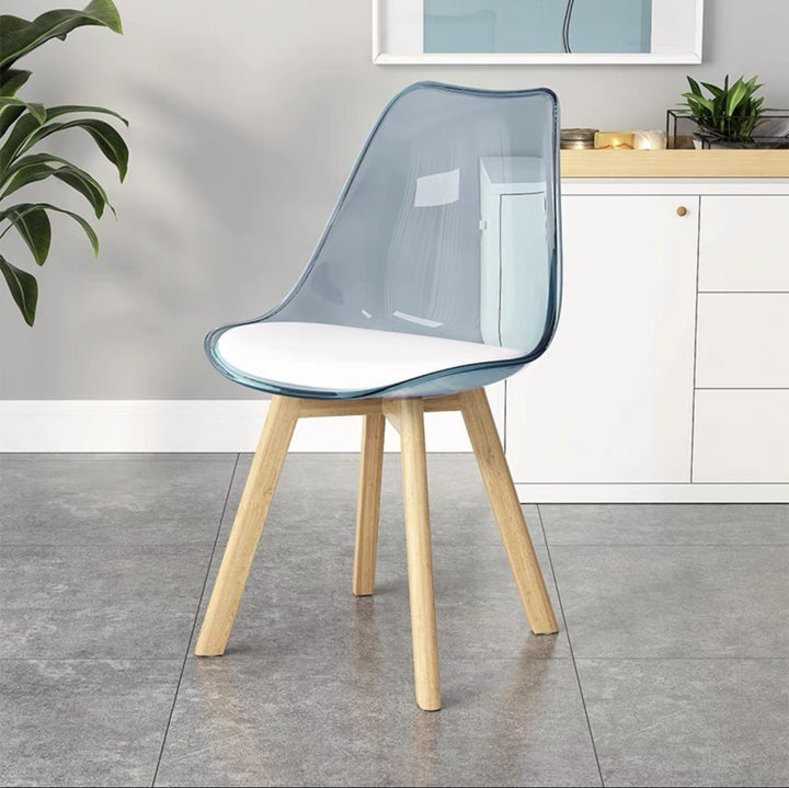 Zeitgenössischer nordischer transparenter PU-Leder-PC-gepolsterter Hochlehner-Esszimmerstuhl ohne Armlehnen für das Esszimmer 