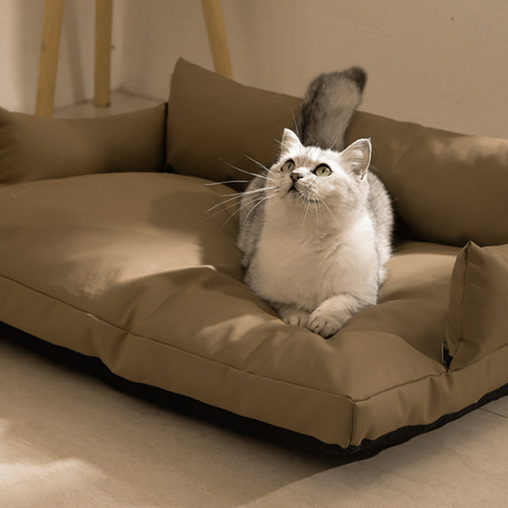 Modern Luxury Faux Leather PP Cotton Nonwoven Fabric Sofa Shaped Cozy Cat Bed For Living Room