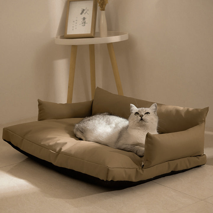 Modern Luxury Faux Leather PP Cotton Nonwoven Fabric Sofa Shaped Cozy Cat Bed For Living Room