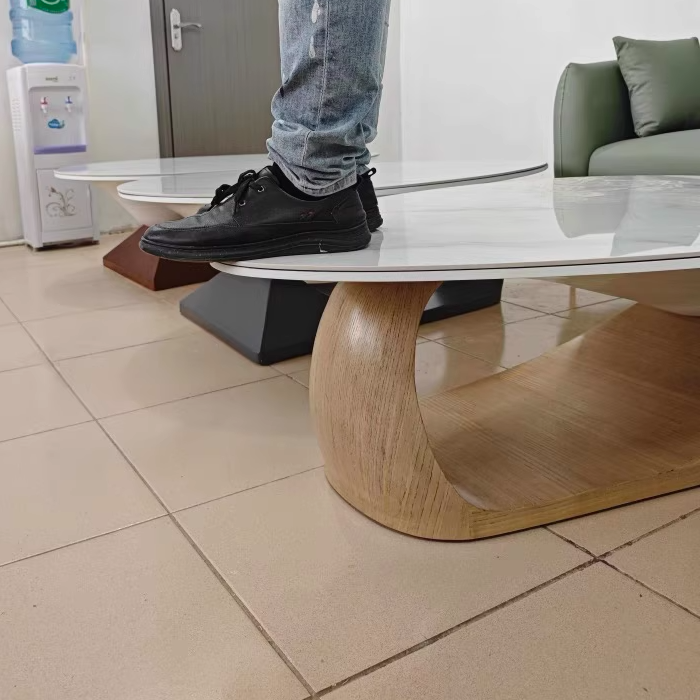 Table basse ovale moderne minimaliste en dalle de roche et panneau de bois pour salon et chambre