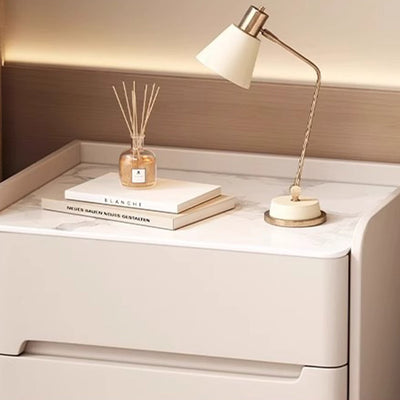 Moderna mesita de noche cilíndrica rectangular de lujo de piedra sinterizada de cuero y madera con 2 cajones para dormitorio 