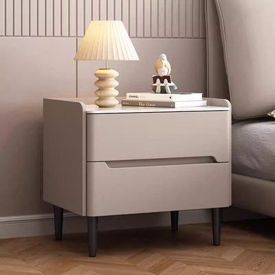 Moderna mesita de noche cilíndrica rectangular de lujo de piedra sinterizada de cuero y madera con 2 cajones para dormitorio 