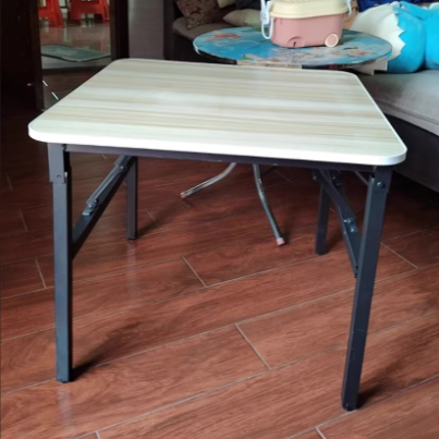 Table basse carrée pliante en acier au carbone et panneau de fibres à densité moyenne nordique contemporaine pour salon 