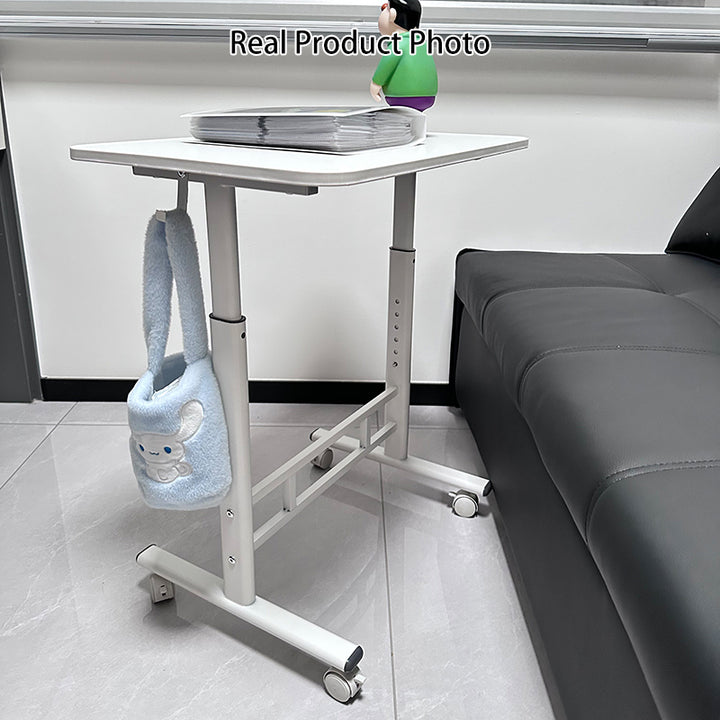 Escritorio de estudio moderno minimalista de MDF y acero al carbono con forma rectangular redondeada y altura ajustable para sala de estar 