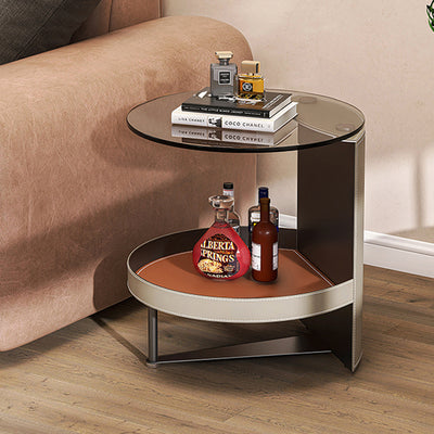 Zeitgenössischer nordischer runder Eisen-Glas-Sattel-Leder-Beistelltisch 2-stufig für das Wohnzimmer 