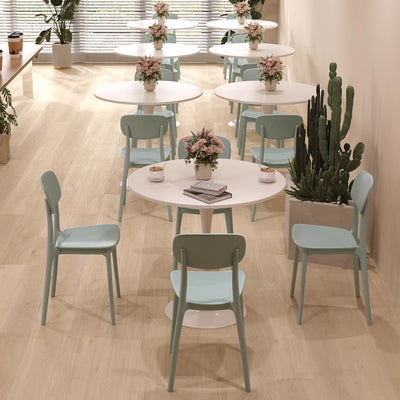 Table à manger moderne minimaliste ronde en panneau de densité et fer pour salle à manger 