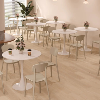 Table à manger moderne minimaliste ronde en panneau de densité et fer pour salle à manger 