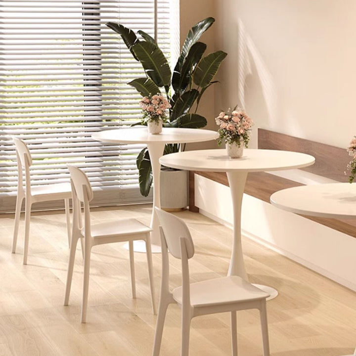 Moderner minimalistischer runder Esstisch aus Spanplatte und Karbonstahl für das Esszimmer 