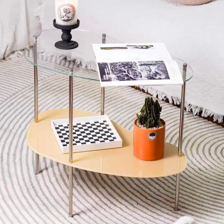 Table basse moderne en métal à deux niveaux avec plateau en acrylique incurvé pour salon 