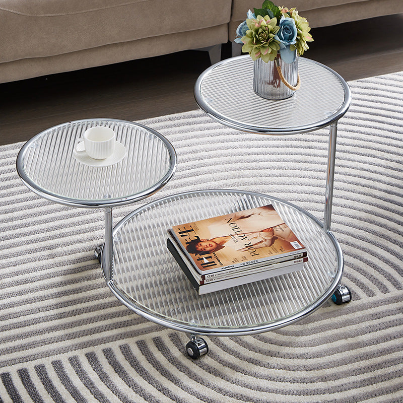 Table basse rotative moderne de style milieu du siècle avec plateau rond en verre nervuré à 2 niveaux avec roulettes pour salon 